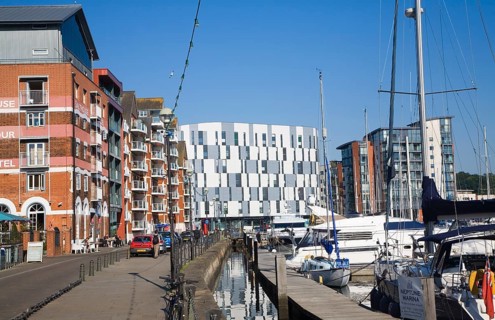 Modern university building at centre of waterfront urban redevelopment, Wet Dock, Ipswich, Suffolk,