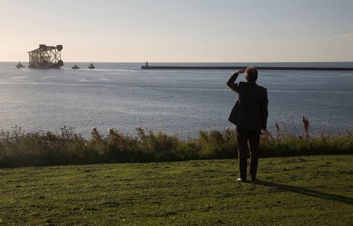 Large North Sea oil drilling platform leaving the River Tyne, Tynemouth, Northumberland, England,