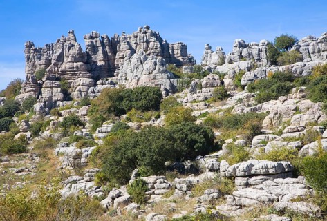 Dramatic limestone scenery of rocks shaped by erosion and weathering at El Torcal de Antequera