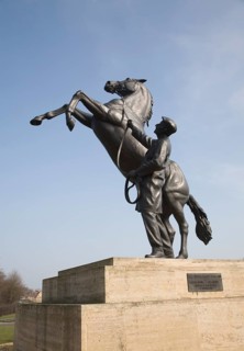 The Newmarket stallion sculpture by Marcia Astor and Allan Sly 2000 near the National Stud,