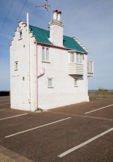 Tiny miniature seaside house called Fantasia on the seafront at Aldeburgh, Suffolk, England, United