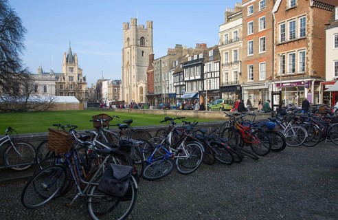 View over bicycles of King's Parade and Great St Mary's church, Cambridge, England, United Kingdom,