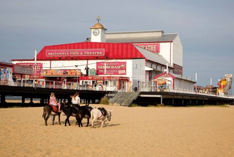 Donkey rides on sandy beach at Great Yarmouth, Norfolk, England, United Kingdom, Europe