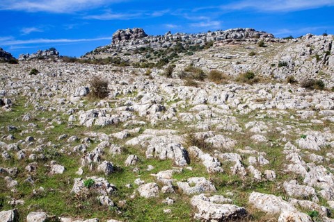 Dramatic limestone scenery of rocks shaped by erosion and weathering at El Torcal de Antequera