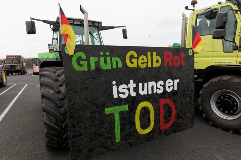 Tractor with sign, Green Yellow Red is our death, farmer protests, demonstration against the policy
