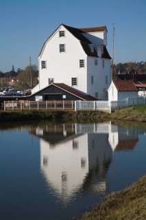 Tide mill pool reflection in mill pond Eiver Deben, Woodbridge, Suffolk, England. The present mill