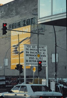 Checkpoint Charlie with building of the Union-Druckerei, a company of the CDU of the GDR, on whose