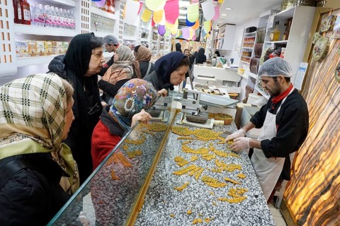 Sweet pastries, nuts and spices in a bazaar in Tehran, Iran, 09/03/2019, Asia