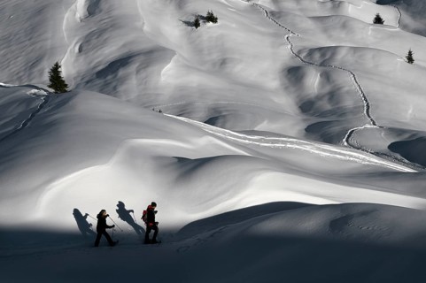 Snowshoe hiking in the Beverin nature park Park, Graubuenden, Switzerland, Europe