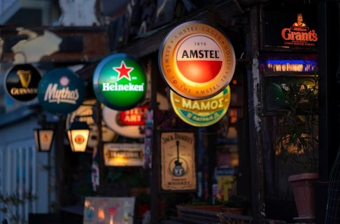 Illuminated advertising for beer brands, Logos, Amstel, Heineken, Mythos, Grants, Bar, Peraia, also