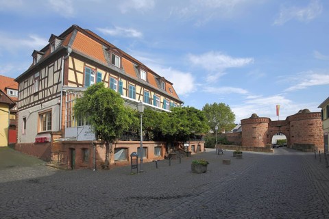 Half-timbered house in the suburb with Jerusalem Gate, historic town fortifications, landmark,