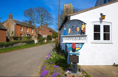 Village sign and houses, Happisburgh, Norfolk, England, United Kingdom, Europe