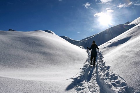 Snowshoe hiking in the Beverin nature park Park, Graubuenden, Switzerland, Europe