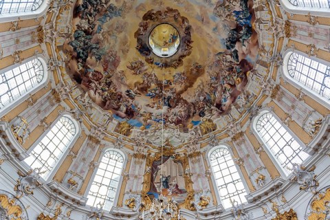 Baroque ceiling fresco with angels and golden ornaments in a magnificent church, Benedictine Abbey