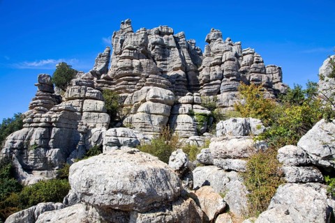 Dramatic limestone scenery of rocks shaped by erosion and weathering at El Torcal de Antequera