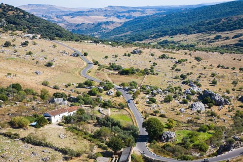 Road running through landscape in Sierra de Grazalema natural park, Cadiz province, Spain, Europe
