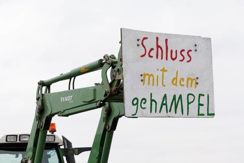 Tractor with a sign, Stop the banging, Farmers' protests, Demonstration against the policies of the