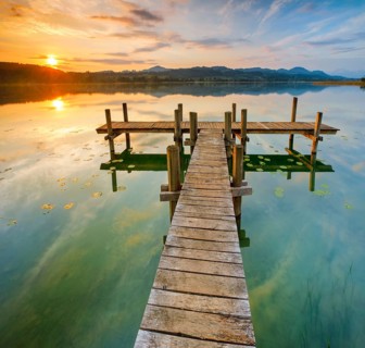 Wooden footbridge on Lake Pfaeffikon at sunrise, Pfaeffikon, Canton Zurich, Switzerland, Europe