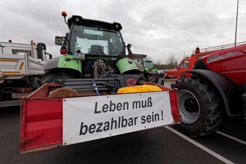 Life must be affordable, banner on a tractor, farmers' protests, demonstration against policies of