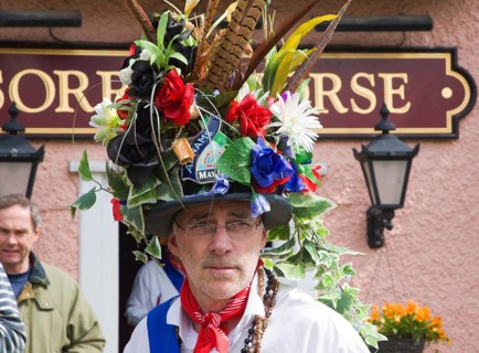 Traditional Morris Men doing country dancing in the village of Shottisham, Suffolk, England, United