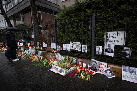 Photos, candles, grave lights and flowers for the Russian opposition leader Alexei Navalny, who