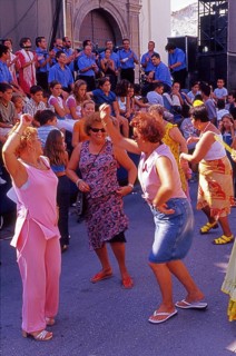 Elderly women dance flamenco at street party in Velez-Malaga, Andalusia, Spain, Southern Europe.