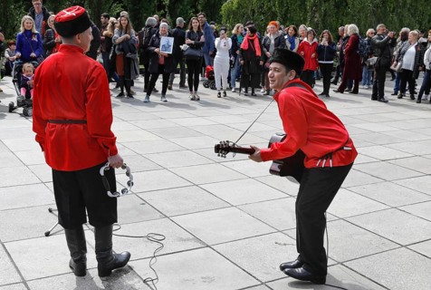 Musicians play Russian folk music on the 74th anniversary of the victory of Russia over Germany, at