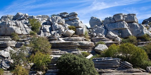 Dramatic limestone scenery of rocks shaped by erosion and weathering at El Torcal de Antequera