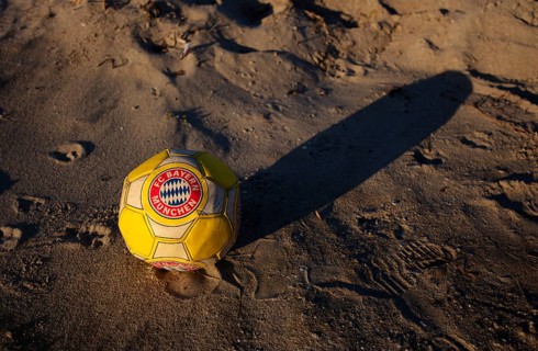 Capped football, leather ball, FC Bayern Munich logo, FCB, air is out, symbolic image, symbolic,