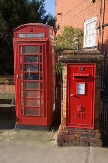 Traditional red telephone box and Royal Mail letter box, Woodbridge, Suffolk, England, United