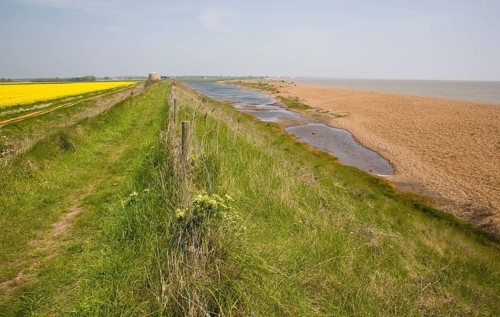 Shingle beach bar and lagoon formed by north to south longshore drift at Bawdsey, Suffolk, England,