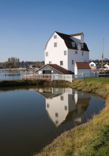 Tide mill pool reflection in mill pond Eiver Deben, Woodbridge, Suffolk, England. The present mill
