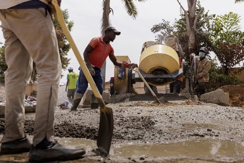 Young men working on a construction site in Nigeria, 06.02.2024