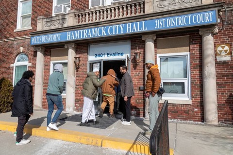Hamtramck, Michigan USA, 25 February 2024, Abraham Aiyash (holding door), Majority Floor Leader in
