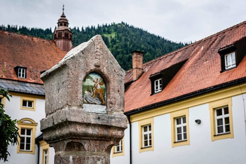 Historic buildings and mountains in the background, Benedictine Abbey Ettal, Bavaria