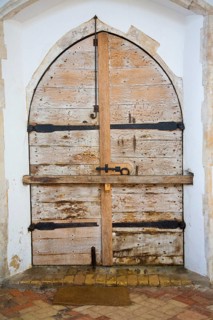 Claw marks of the legendary Black dog of Bungay on doors of Holy Trinity church, Blythburgh,