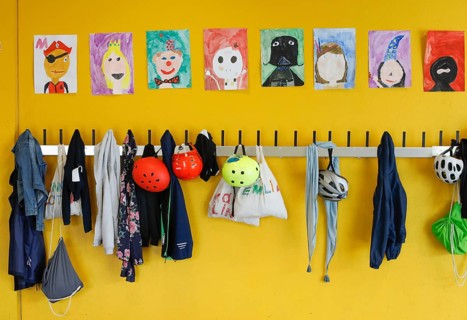 Jackets and bags hanging at a cloakroom in a Berlin primary school, 14/08/2019