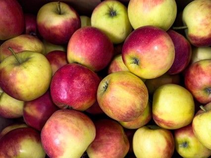 Locally grown apples locally produced in grocery shop display grocery store grocer supermarket,