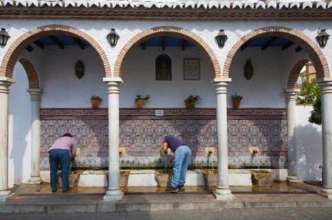 Moorish water fountain in the Andalucian village of Alcaucin, Malaga province, Spain, Europe
