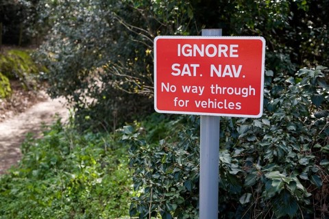 Ignore Sat Nav No way through for vehicles sign, UK