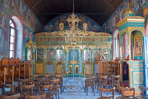 Interior of a church with iconostasis and wooden chairs, Monastery of St Nicholas, Monastery of