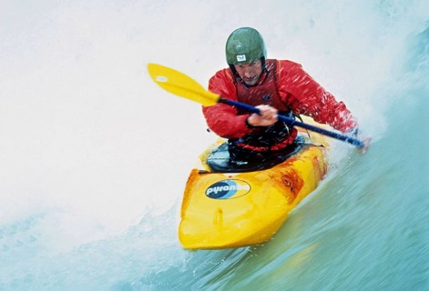Kayaker on the Isar at high water, Wittelsbacherbruecke, Munich, Bavaria, Germany, vintage, retro,