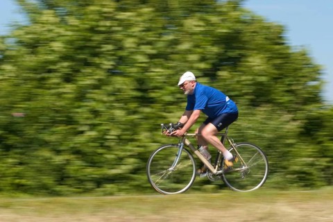 Senior on bicycle, vintage, retro