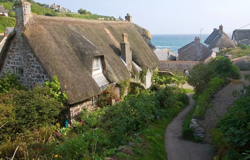 Thatched cottages in the historic and attractive fishing village of Cadgwith Cobve on the Lizard
