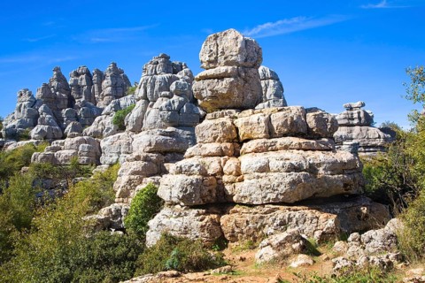 Dramatic limestone scenery of rocks shaped by erosion and weathering at El Torcal de Antequera