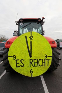 Five to twelve, That's enough, Sign with clock on a tractor, Farmer protests, Demonstration against