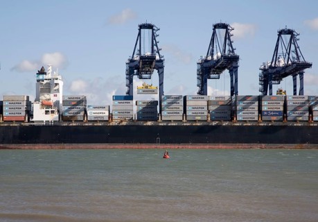 Cranes and container ships at Trimley Docks part of the Port of Felixstowe, Britain's busiest