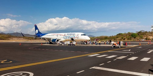 AeroMexico Embraer EJS-190 aircraft at the airport of Huatulco, Baja de Huatulco, South Pacific