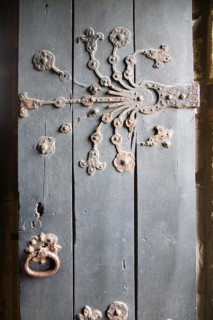 Ornate metalwork hinges on the door to the Percy family chapel, Tynemouth priory, Northumberland,