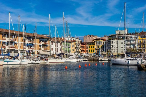 Sailing boats in the harbour, island of the lagoon town of Grado, north coast of the Adriatic Sea,